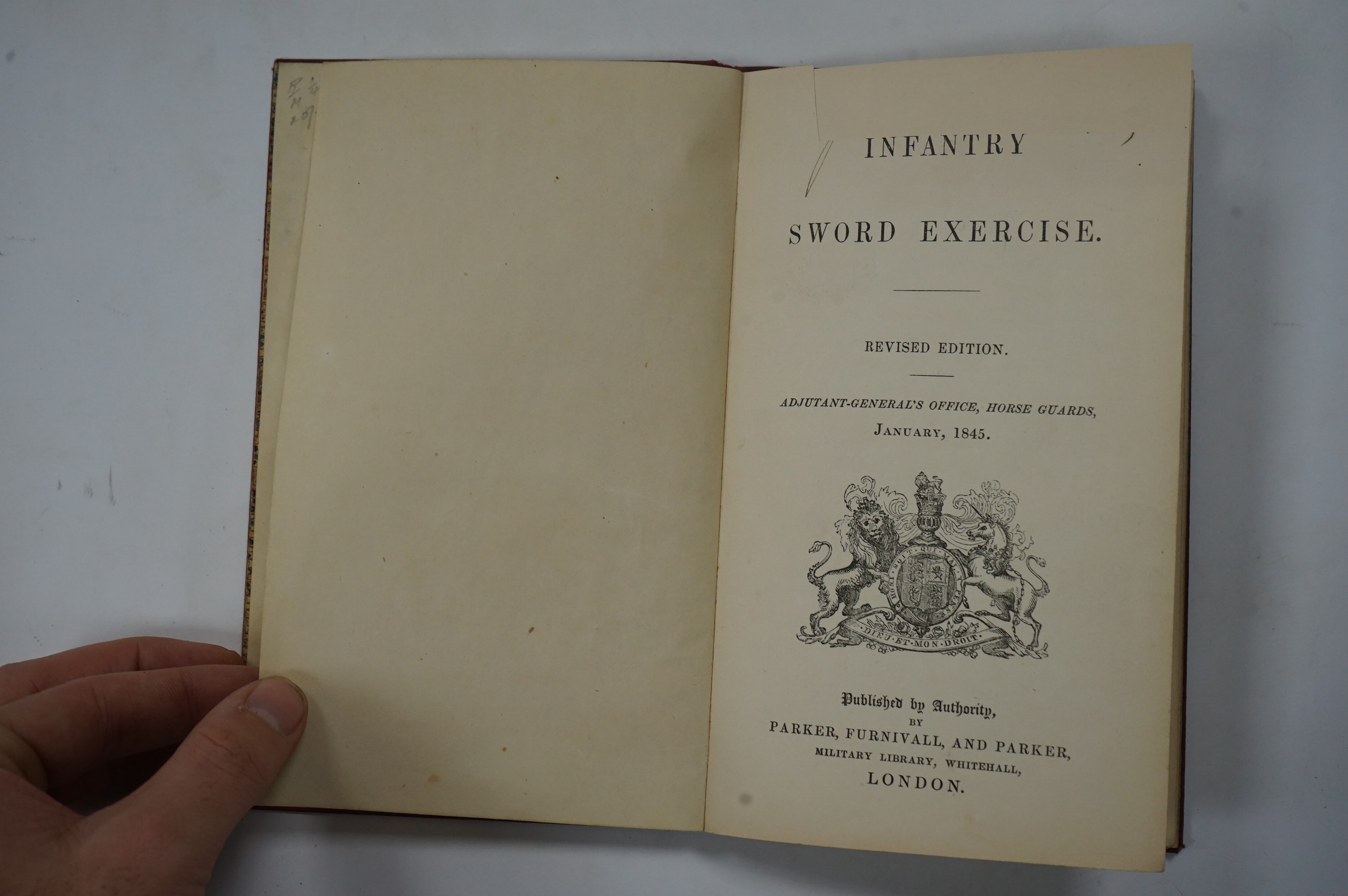 Adjutant-General’s Office, Horse Guards [Henry Charles Angelo] - Infantry Sword Exercise, Revised Edition, January, 1845, London, Parker, Furnival, and Parker, Military Library, Whitehall, original red cloth.